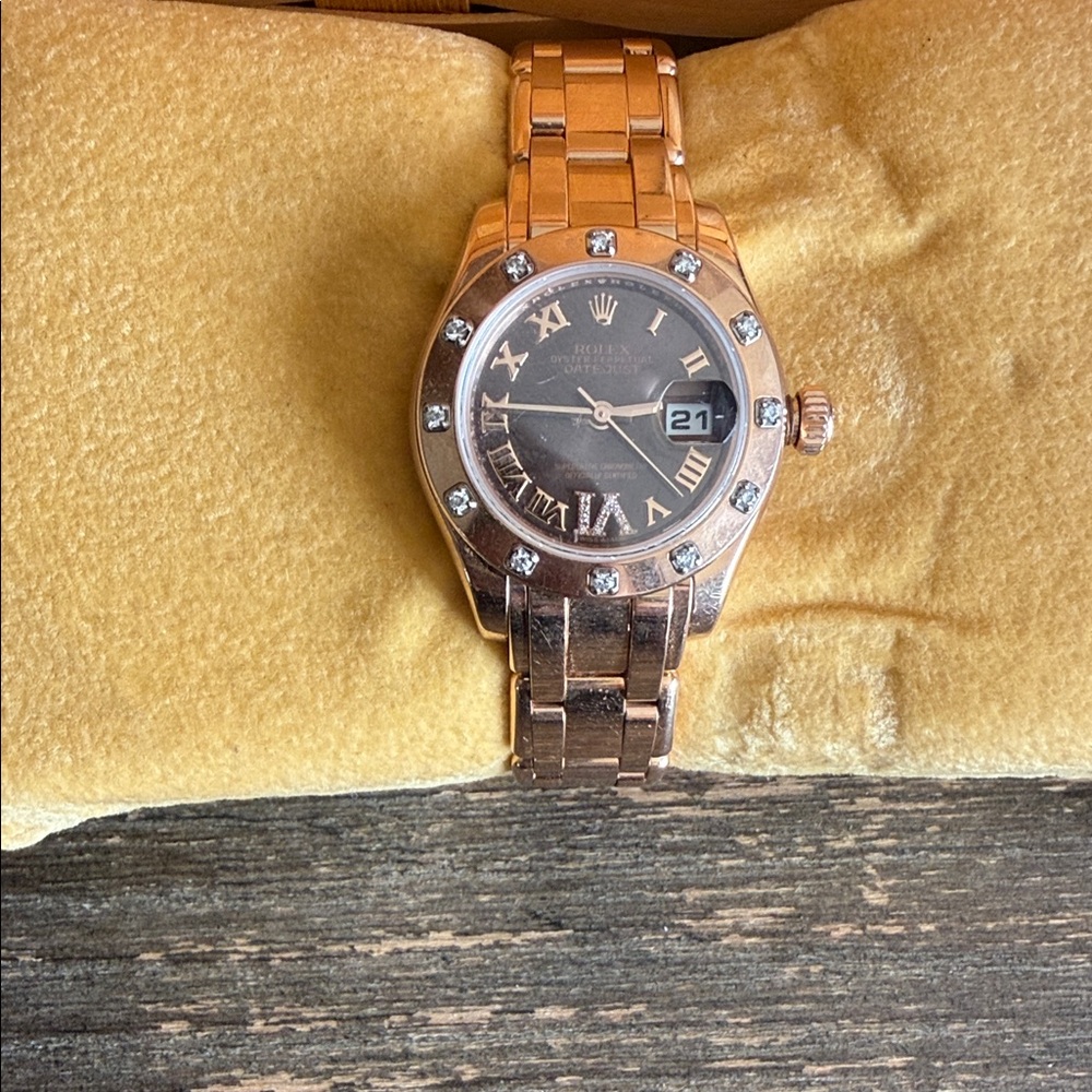 Rolex Rose Gold Timepiece with Diamond Markers